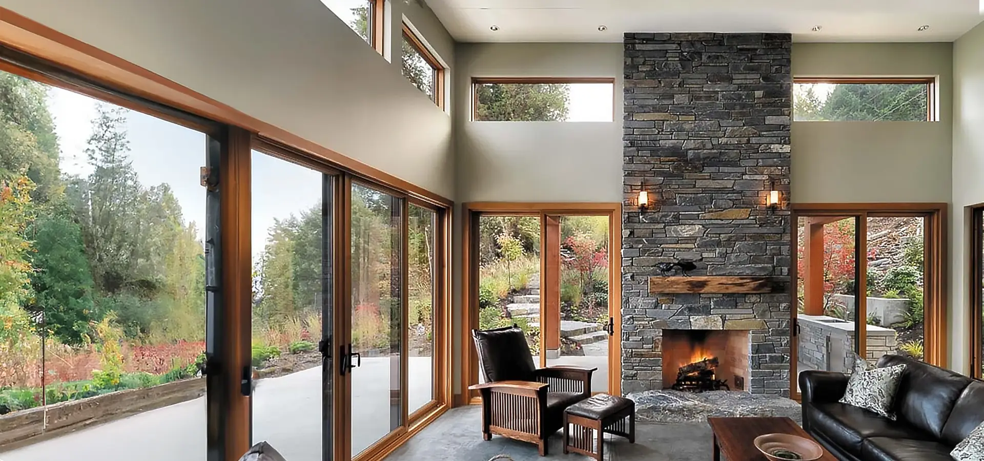 stone wall fireplace in beautiful renovated home